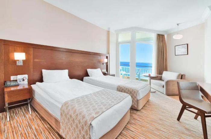 Salamis Bay Conti Resort Hotel & Casino Gazimağusa Oda fotoğraf A typical hotel room