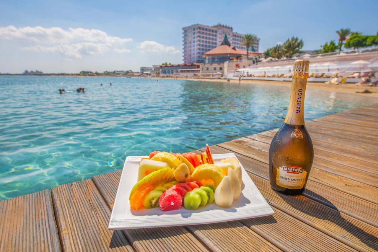 Salamis Bay Conti Resort Hotel & Casino Gazimağusa Dış mekan fotoğraf A bottle of Milaneza sparkling wine